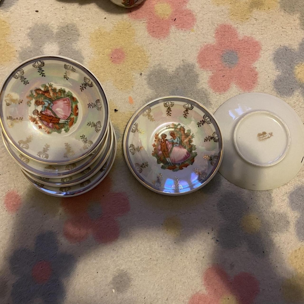 Vintage Decorative Saucer Set with Floral Design